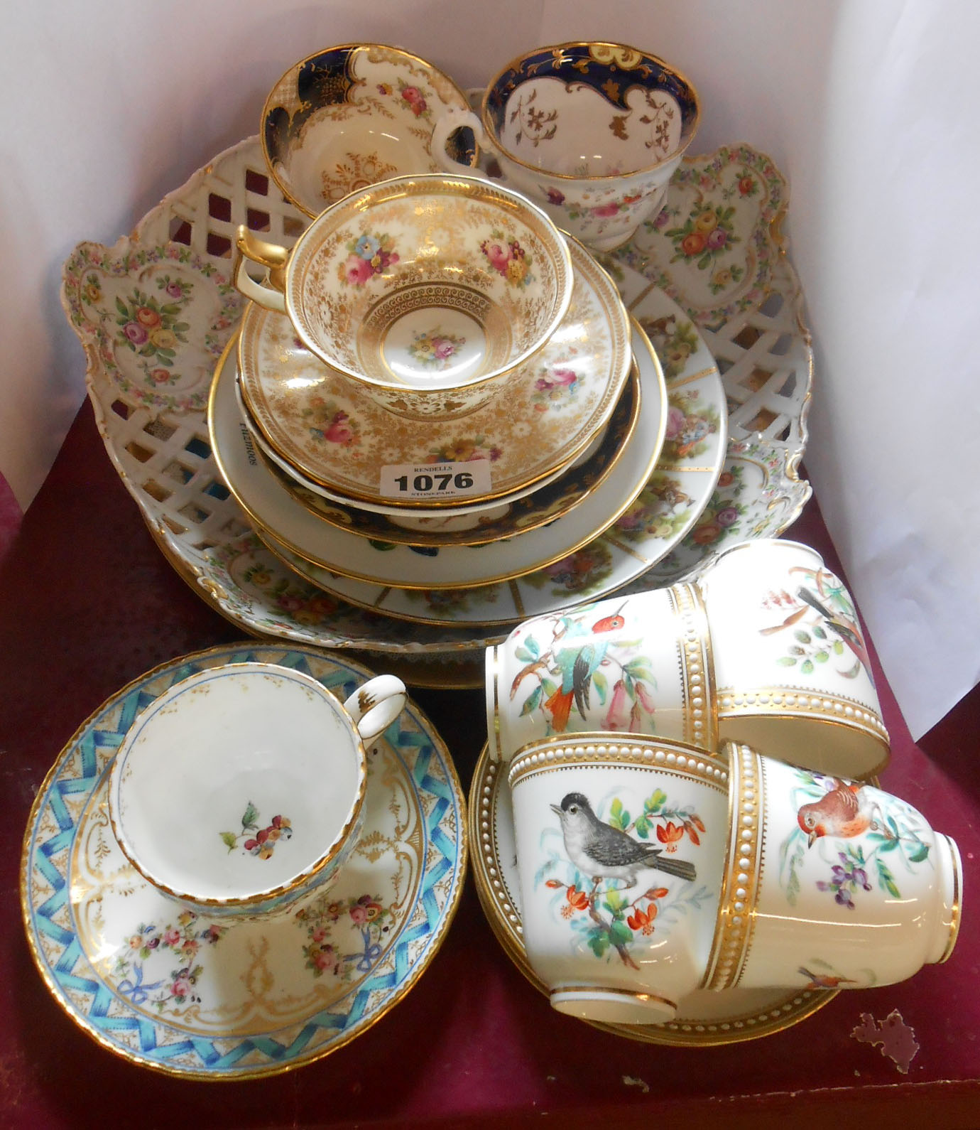 A quantity of assorted ceramic items including continental porcelain pierced dish, cups and saucers,
