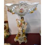 A large 20th Century Dresden porcelain table centrepiece, the central flower encrusted column