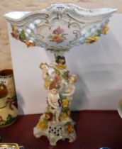 A large 20th Century Dresden porcelain table centrepiece, the central flower encrusted column