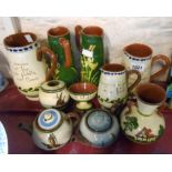 A quantity of Torquay pottery items including jugs, vases, etc. - various makers including Watcombe,