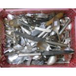 A crate containing a quantity of assorted silver plated cutlery