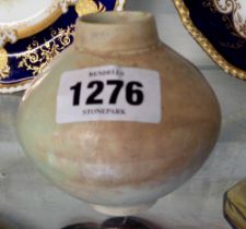 A small porcelaneous stoneware Fullneck studio pottery vase with mottled souffle glaze