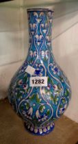 An old Middle Eastern pottery vase with Persian style decoration - a/f