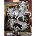 A box containing a pair of spelter Marley horse figural ornaments