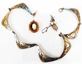 A vintage Danish handmade 'Weiss pewter' boomerang link necklace with decorated panels, in the style