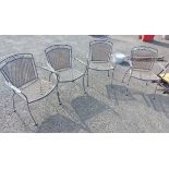 Four metal garden chairs