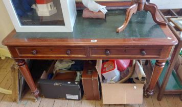 A 1.2m late Victorian mahogany writing table with green leather inset top and two frieze drawers,