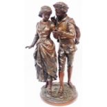 A large French spelter figure, depicting a pair of lovers with signature to base and bronze effect