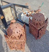 A pair of metal garden lanterns in the Moroccan style - sold with a quantity of old hurricane lamps