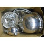 A silver plated meat dome, muffin dish, footed bowl, two entree dishes and two ornate handles