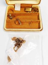 A small case containing 375 and other yellow metal earrings and stud earrings, also plated locket