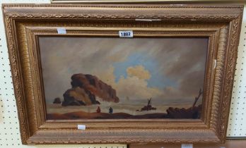 A gilt framed antique oil on canvas, depicting a coastal view with rocks in foreground