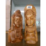 Two African carved hardwood female figures with ornate headdresses