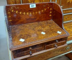 A 34cm French reproduction walnut book trough with inlaid swag decoration to raised back and four