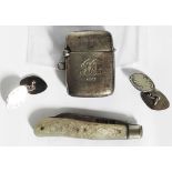 A silver bladed fruit knife with mother-of-pearl clad handle - sold with a silver vesta case and