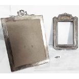 A silver fronted photograph frame with bow pattern pediment (no glass) - sold with another a/f