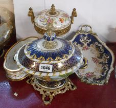 Two continental porcelain lidded bowls with gilt metal mounts and hand painted decoration - sold