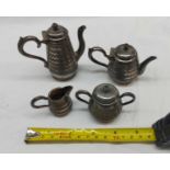 A miniature continental silver plated four piece tea and coffee set with engraved bands of