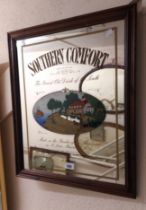 A reproduction stained wood framed Southern Comfort advertising wall mirror with oblong plate
