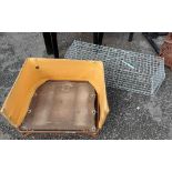 A small animal cage trap - sold with a folding pet bed