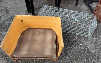 A small animal cage trap - sold with a folding pet bed