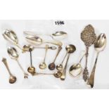 A bag containing a quantity of antique and later English silver small cutlery items including