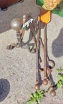 A set of antique steel fire irons - sold with a pair of similar fire dogs