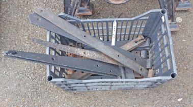 A crate containing a quantity of old wrought iron door hinges