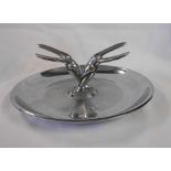 An American Art Deco chrome plated ashtray with stylised cigarette holders of bird form