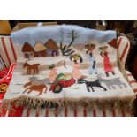A Botswanan united design hand woven wall hanging rug depicting a typical village view