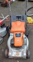 A Flymo Quicksilver 46 SDR petrol lawn mower with Briggs & Stratton '40 Series' 4 stroke engine