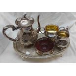A silver plated three piece tea set, on associated tray - sold with a silver plated wine coaster