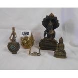An Eastern bronze figure of a seated Buddha under a multi-headed serpent canopy - sold with a