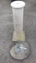 A 69cm high concrete sundial, set on a fluted pillar - repair