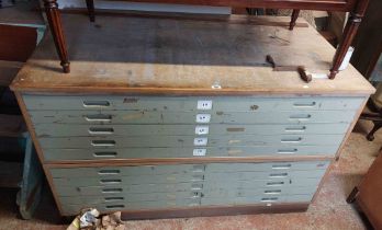 A 1.58m vintage painted wood two part plan chest with flight of ten shallow drawers and panelled