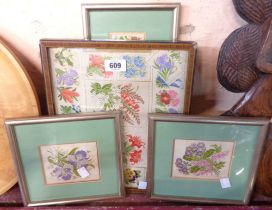Five vintage framed embroidery picture panels depicting flowers
