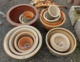 A selection of glazed and other garden plant pots