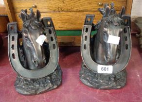 A pair of resin bookends in the form of horses