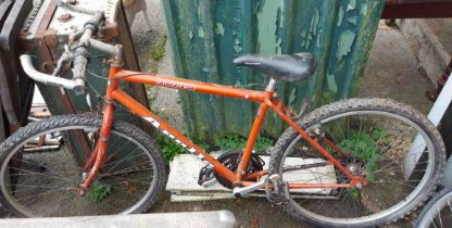 An Apollo Terra ladies' bicycle with orange finish