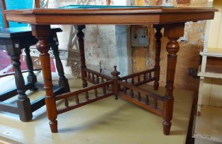 An 88cm Edwardian stained walnut octagonal occasional table, set on turned supports