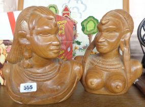 Two African carved hardwood busts, depicting a man and a woman