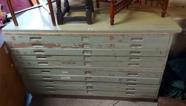 A 1.53m vintage painted wood two part plan chest with flight of ten shallow drawers and panelled