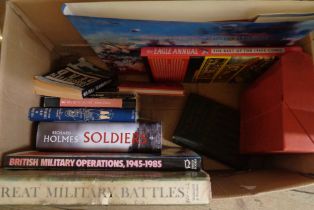 A box containing a collection of military interest hardback and other books - various authors