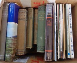 A box containing local interest books including Vian Smith and Eden Philpots titles, etc.
