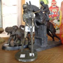 Three resin figurines depicting an elephant duo, lady golfer and a jockey on horse