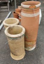 A part painted terracotta chimney pot - sold with two stoneware similar