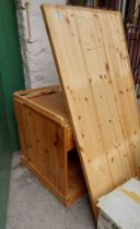 A modern pine twin pedestal desk for reassembly and a modern office chair