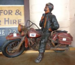 A modern vintage style resin figure depicting a motorcycle and rider