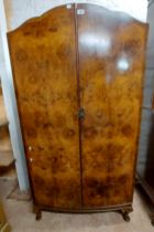 A 92cm vintage figured walnut veneered wardrobe with hanging space drawers enclosed by a pair of