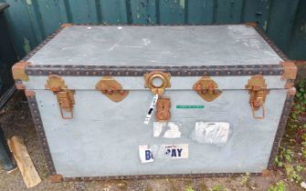 An old lift-top transit trunk